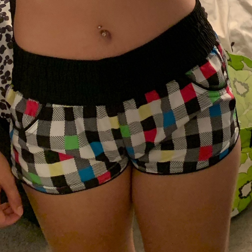 Plaid multicolored swim shorts size small includes pockets